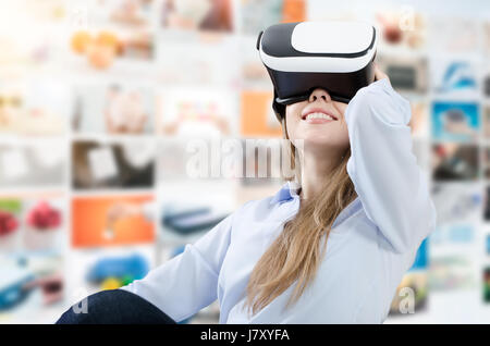 Woman using VR virtual reality glasses. video vr virtual reality games female playing headset concept Stock Photo