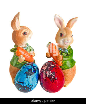 Easter rabbits with colored traditional easter eggs, quails egg, , close up, isolated. Stock Photo
