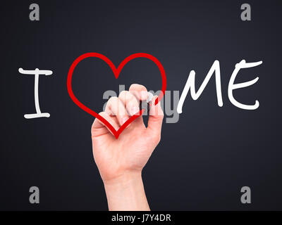 Man hand writing I Love Me on visual screen. Love, family, internet concept. Isolated on black. Stock Photo Stock Photo