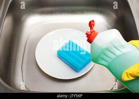 Yellow foam rubber sponge for dishwashing on white background. House  cleaning tool. Simple everyday cleaning sponge studio photo. Everyday  routine dom Stock Photo - Alamy