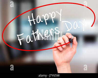 Man Hand writing Happy Fathers Day with black marker on visual screen. Isolated on office. Business, technology, internet concept. Stock Image Stock Photo