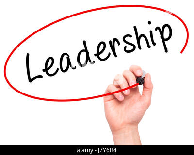Man Hand writing Leadership with black marker on visual screen. Isolated on white. Business, technology, internet concept. Stock Image Stock Photo