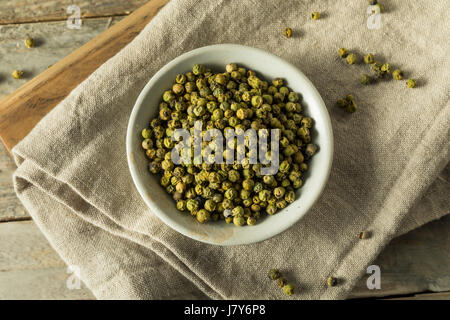 Raw Green Organic Peppercorns Ready to Cook With Stock Photo