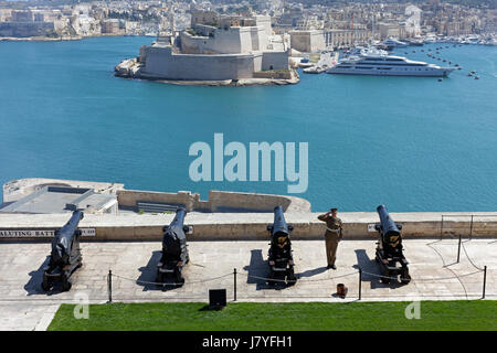 Cannons of the Saluting Battery, view of Fort Saint Angelo, Valletta, Malta Stock Photo