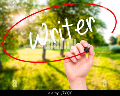 Man Hand writing Writer with black marker on visual screen. Isolated on background. Business, technology, internet concept. Stock Photo Stock Photo