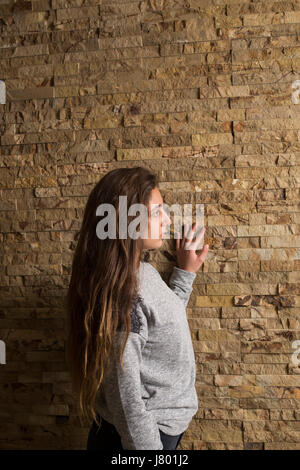 Serious teen girl looking away Stock Photo