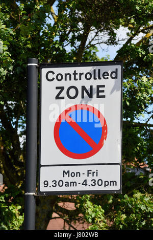 No parking controlled zone road sign with times, close to Southend hospital Stock Photo