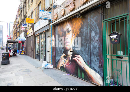 Street art portrait of a black woman by Neequaye Dreph in Shoreditch, East London, UK Stock Photo