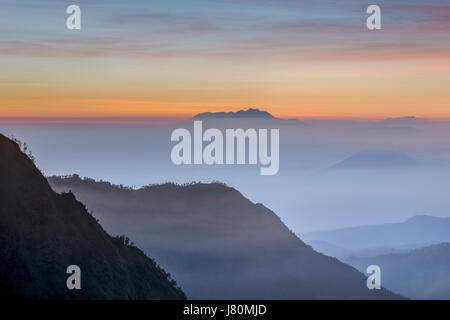 View on Mount Bromo with clouds Stock Photo - Alamy
