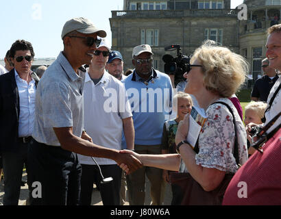 Former US president Barack Obama meets well-wishers as he plays a round of golf at St Andrews Golf Club, near Dundee in Scotland. Stock Photo