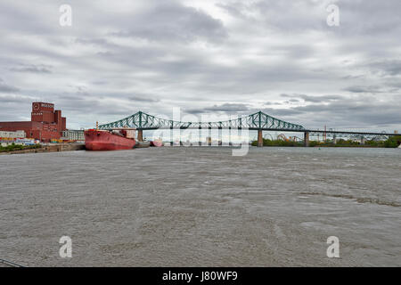 MONTREAL, QUEBEC, CANADA - 19 MAY 2017: View of St. Lawrence River and Jacques Cartier bridge Stock Photo