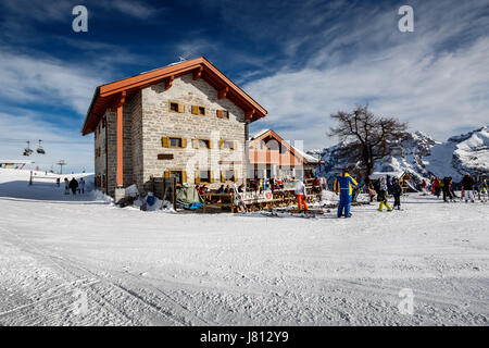 MADONNA DI CAMPIGLIO, ITALY - JANUARY 9, 2013: Typical Ski Restaurant with open terrace in Madonna di Campiglio Ski Resort located on Pradalago Peak. Stock Photo