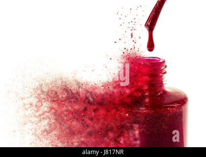 Exploding bottle of red nail varnish Stock Photo