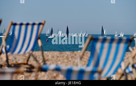 Brighton, UK. 26th May, 2017. Hundreds of yachts gather off Brighton beach for the start of the annual Royal Escape Race to France with today forecast to be the hottest day of the year so far with temperatures reaching the high 20s celsius in some parts of Britain Credit: Simon Dack/Alamy Live News Stock Photo