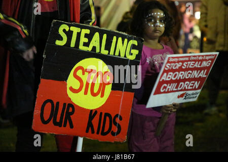 Sydney, Australia. 26th May, 2017. Twenty years since the release of the Bringing them Home report, a candle lit vigil and march was held in Sydney on National Sorry Day. Protesters assembled at Victoria Park, Broadway and marched to Central Station, platform 1 where Aboriginal children had been separated from their families and sent to institutions and foster homes. Speakers recalled memories of abuse and sadness at being taken from their families. Credit: Richard Milnes/Alamy Live News Stock Photo