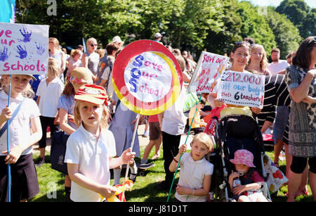 Brighton, UK. 26th May, 2017. Parents from Brighton and Hove schools take part in the 'Save Our Schools' (SOS) campaign protest rally at The Level in Brighton today against education cuts by the governement Credit: Simon Dack/Alamy Live News Stock Photo