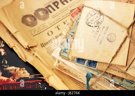 A stack of old postal letters of the 20th century and  the funeral photo of Stalin on the newspaper Pravda Stock Photo