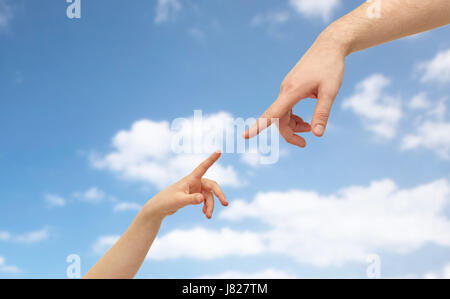 father and child hands pointing fingers Stock Photo