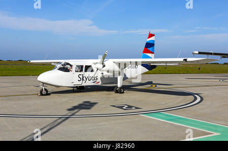 A Britten-Norman BN-2 Islander Isles of Scilly Skybus aeroplane or aircraft shuttle service between Lands End airport and the Isles of Scilly Stock Photo