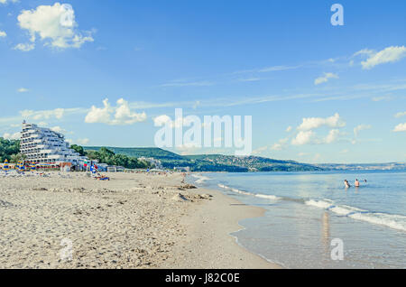 ALBENA, BULGARIA - JUNE 13, 2016. The Black Sea shore with hotels, beach with blue clear water and sand, sky with fluffy clouds Stock Photo