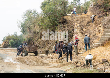 Repairs after rain at Mawsynram on the Mawpun road, Meghalaya, India Stock Photo