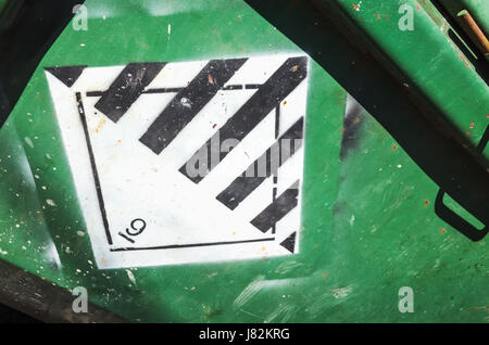 Warning sign on green cargo container. Hazard class 9. Miscellaneous dangerous substances Stock Photo