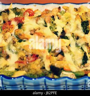 Baked pasta with ham and cheesy Stock Photo