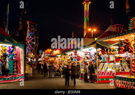 Evergreen State Fair at twilight with game booths at night Monroe Washington State USA Stock Photo