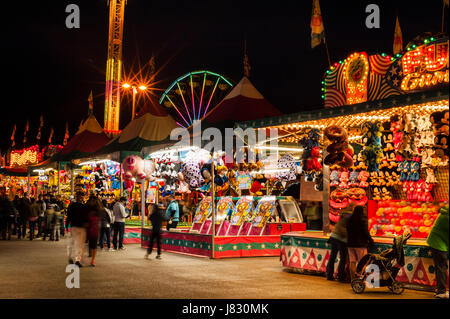 Evergreen State Fair at twilight with game booths at night Monroe Washington State USA Stock Photo