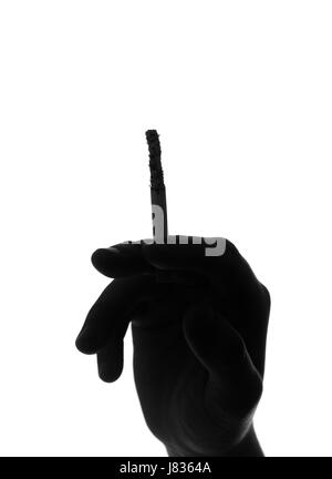 still life hand health male masculine studio silhouette smell product smoker Stock Photo