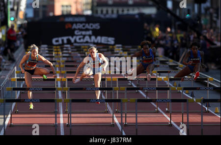 Sally Pearson (centre left) before winning the Women's 100m Hurdles ahead of (left-right) Isabelle Pedersen, Tiffany Porter and Cindy Ofili during the Arcadis Great CityGames at Deansgate, Manchester. Stock Photo