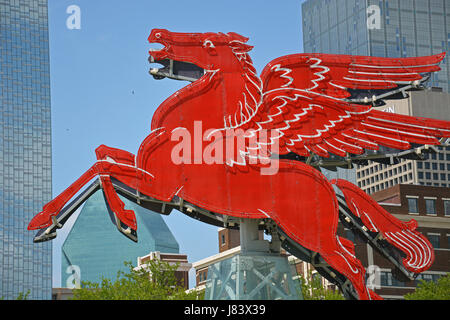 The iconic Pegasus 'flying horse' sat on top of the Magnolia Building in downtown Dallas for 60 years before being restored at the Omni Hotel Plaza. Stock Photo