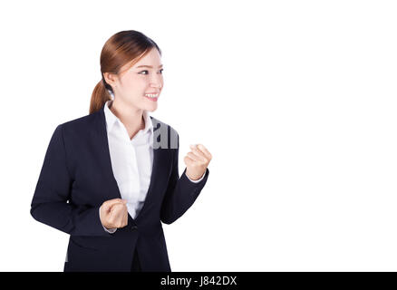 Successful business  woman with arm raised isolated on white background Stock Photo