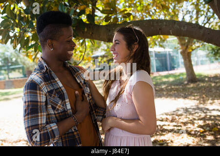 Romantic couple having fun together in the park Stock Photo