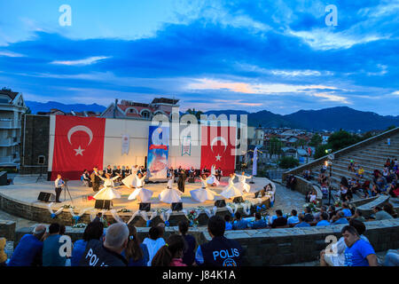 At Marmaris amphitheater in Marmaris, Mugla, Turkey - May 26, 2017 : Whirling dervishes show and religious music concert for begining of ramadan at Ma Stock Photo