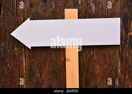 White blank signs pointing in directions nature back ground Stock Photo