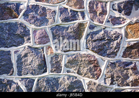 Old stone wall rustic texture background. Blue and gray retro stone wall background. Brick rock texture Stock Photo