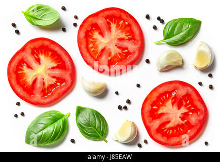 tomato, garlic and basil isolated on white background, top view Stock Photo