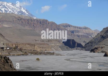 asia ravine river bed nepal mustang himalayas blue travel stone hike go hiking Stock Photo