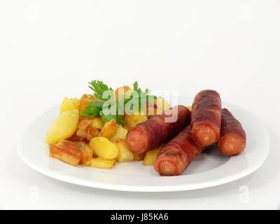 bernese bacon sausages with fried potatoes Stock Photo