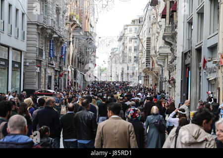 ISTANBUL, TURKEY - MAY 19, 2017: People on Istiklal Street. Istiklal Street is the most popular destination of Istanbul for shopping and entertainment Stock Photo