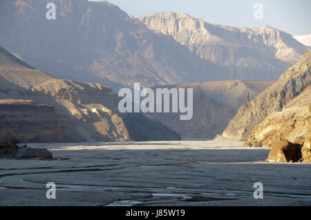 asia ravine river bed nepal mustang himalayas blue travel stone hike go hiking Stock Photo