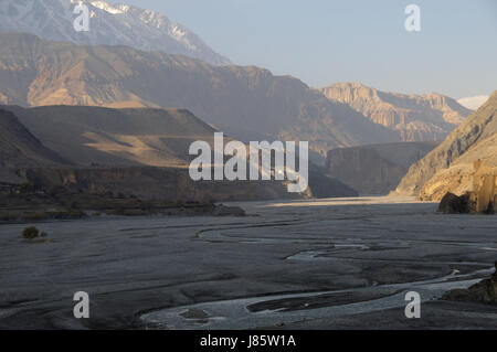 asia ravine river bed nepal mustang himalayas blue travel stone hike go hiking Stock Photo