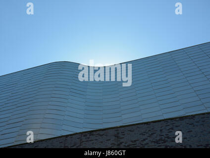 Modern building exterior with aluminium rainscreen cladding, sunlight ...