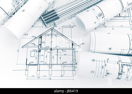 house plan blueprints and folding ruler on architects workplace Stock Photo