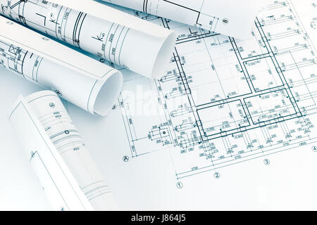 Architecture plan and rolls of blueprints Stock Photo - Alamy