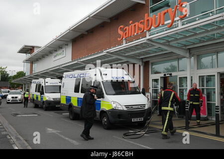 Blackheath, West Midlands, UK. 27th May, 2017. Armed police have arrested a man carrying a knife amid reports of a 'bomb scare' at a Sainsbury's in Blackheath in the West Midlands. Panicked shoppers have been evacauted from the Sainsbury's supermarket after police arrested a man carrying a knife. Credit: Terry Mason/Alamy Live News Stock Photo