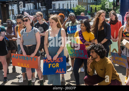 London, UK. 27th May 2017. Unfortunately I cannot show the whole crowd at the North London Sisters Uncut rally at Camden Rd as photographers were asked not to photograph a few women there who were wearing white crosses. The 'general election rally'  was in protest against Tory budgets that have cut support for refuges for victims of domestic violence. After I left they marched to the now disused Holloway Prison, occupying the former visitors centre.  The intend to hold a week of workshops on women’s well being, self-defence and legal rights there before leaving. They say the former women's pri Stock Photo