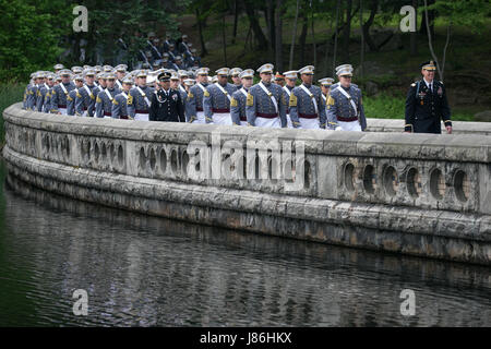 New York, USA. 27th May, 2017. Members of the U.S. Military Academy Class of 2017 march  across Lusk Reservoir as they arrive for graduation ceremonies May 27, 2017 in West Point, New York. Nine hundred thirty-six cadets received their diplomas during the ceremony. Credit: Planetpix/Alamy Live News Stock Photo