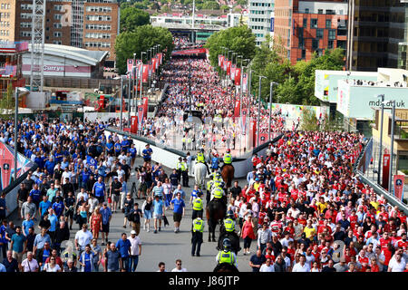 Wembley, London, UK. 27th May, 2017. The Emirates FA Cup Final - Arsenal v Chelsea . Fans make their way to the game before the Emirates FA Cup Final, at Wembley Stadium, London, on May 27, 2017. Credit: Paul Marriott/Alamy Live News Stock Photo